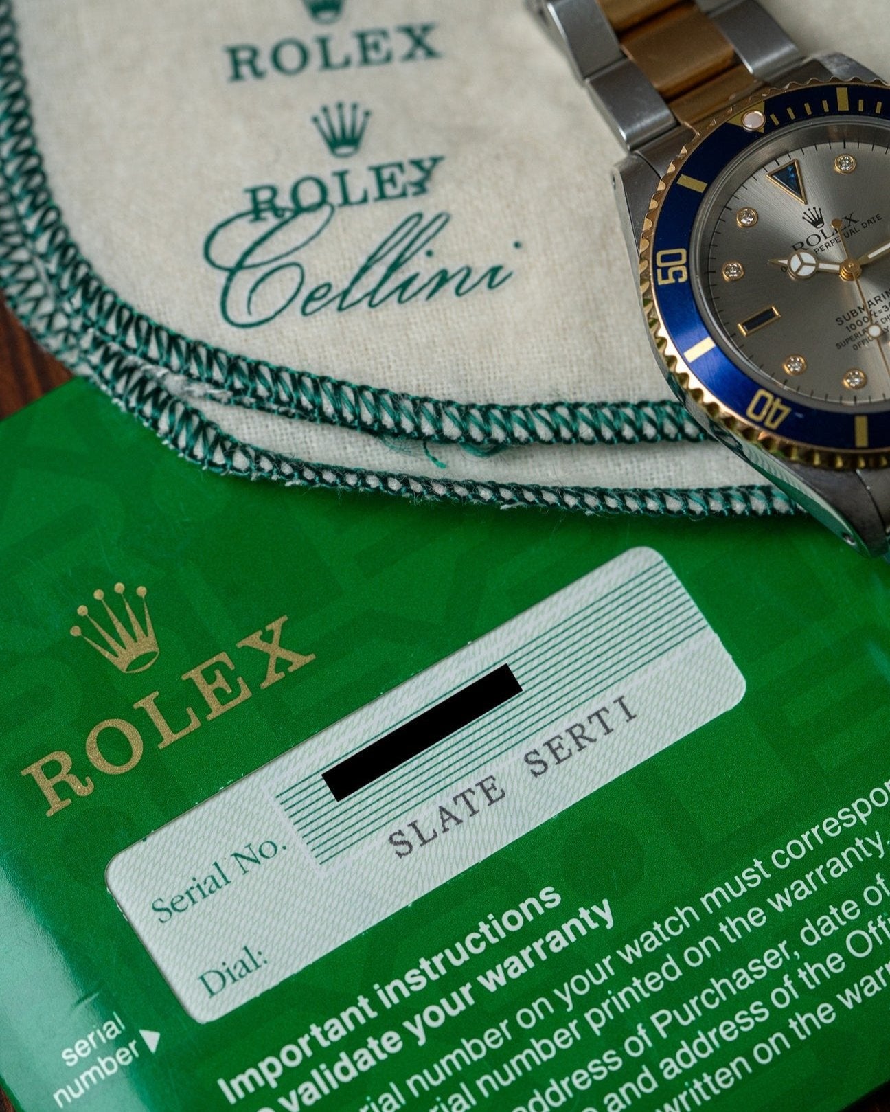 Two Tone Yellow Gold Rolex Submariner 16613 Serti Dial Watch at Alpha Crown Luxury Watches