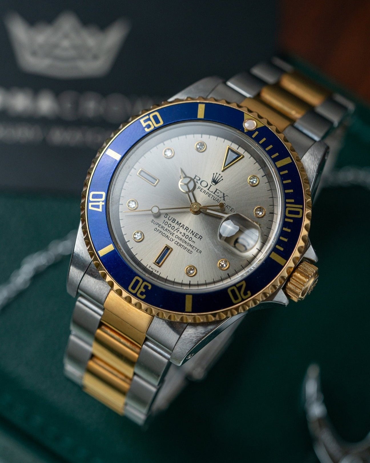 Two Tone Yellow Gold Rolex Submariner 16613 Serti Dial Watch at Alpha Crown Luxury Watches